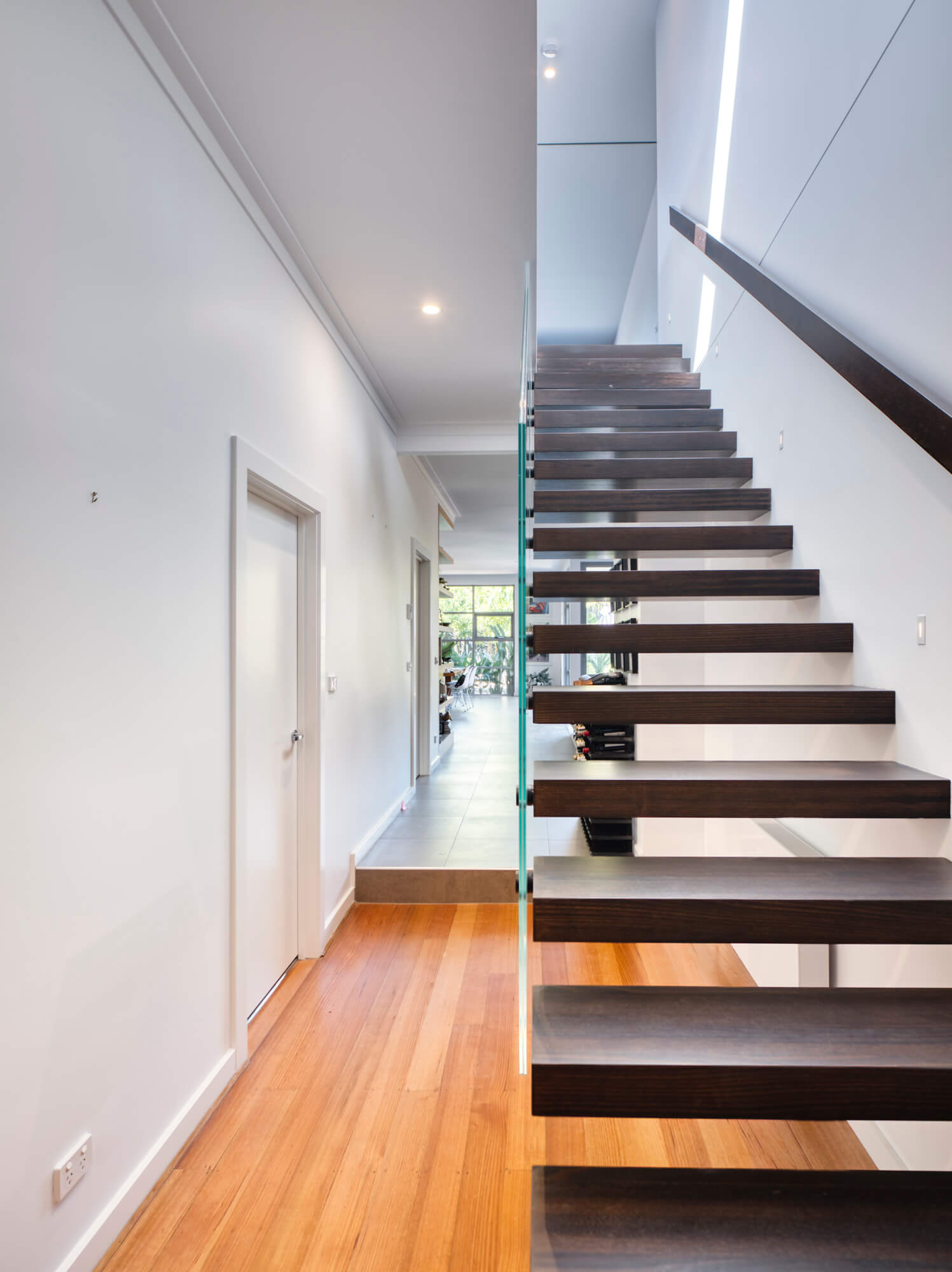 Photo of a modern staircase as part of a single storey addition