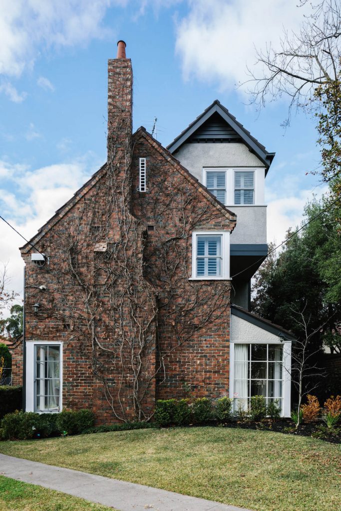 Photo of a single storey addition on an older style home